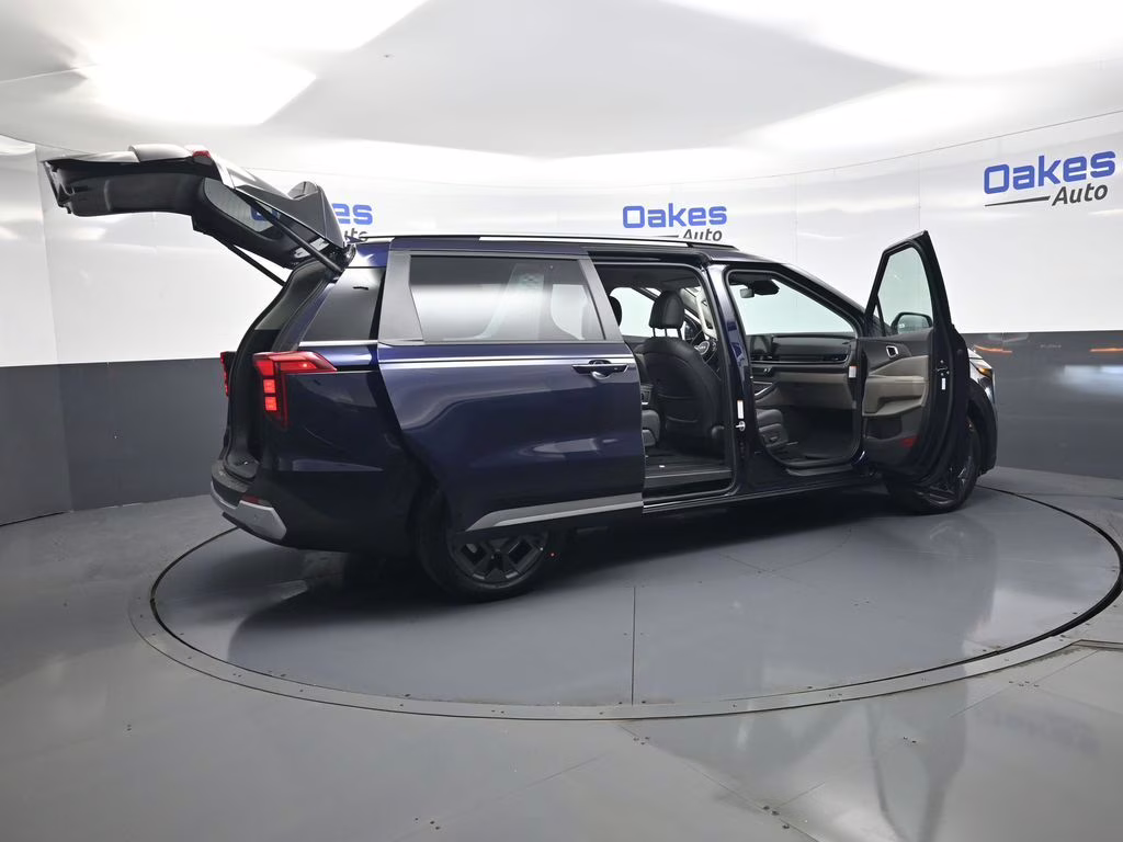 2026 Deep Chroma Blue Kia Carnival Hybrid EX FWD Van