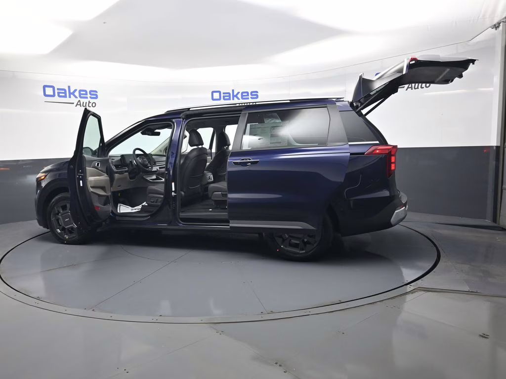 2026 Deep Chroma Blue Kia Carnival Hybrid EX FWD Van