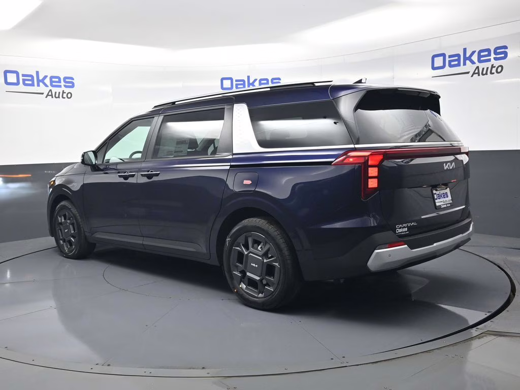 2026 Deep Chroma Blue Kia Carnival Hybrid EX FWD Van