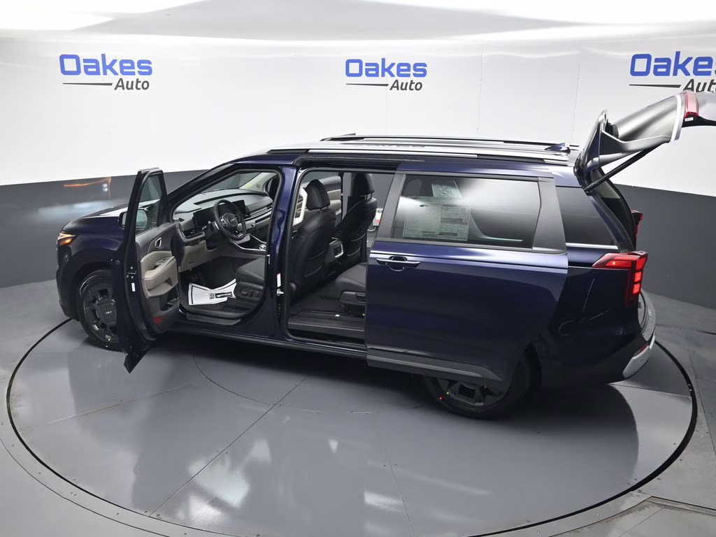 2026 Deep Chroma Blue Kia Carnival Hybrid EX FWD Van