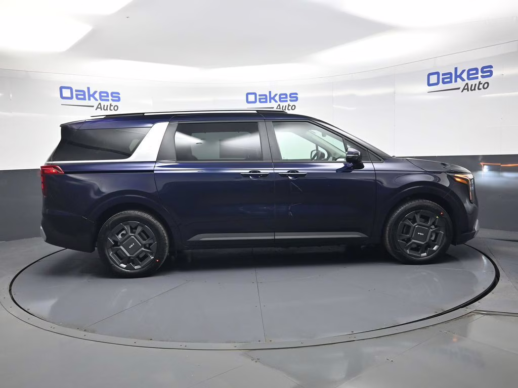 2026 Deep Chroma Blue Kia Carnival Hybrid EX FWD Van