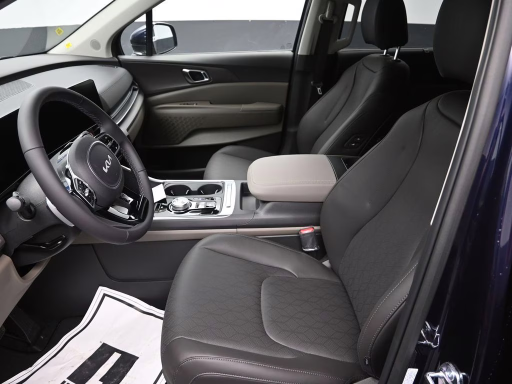 2026 Deep Chroma Blue Kia Carnival Hybrid EX FWD Van