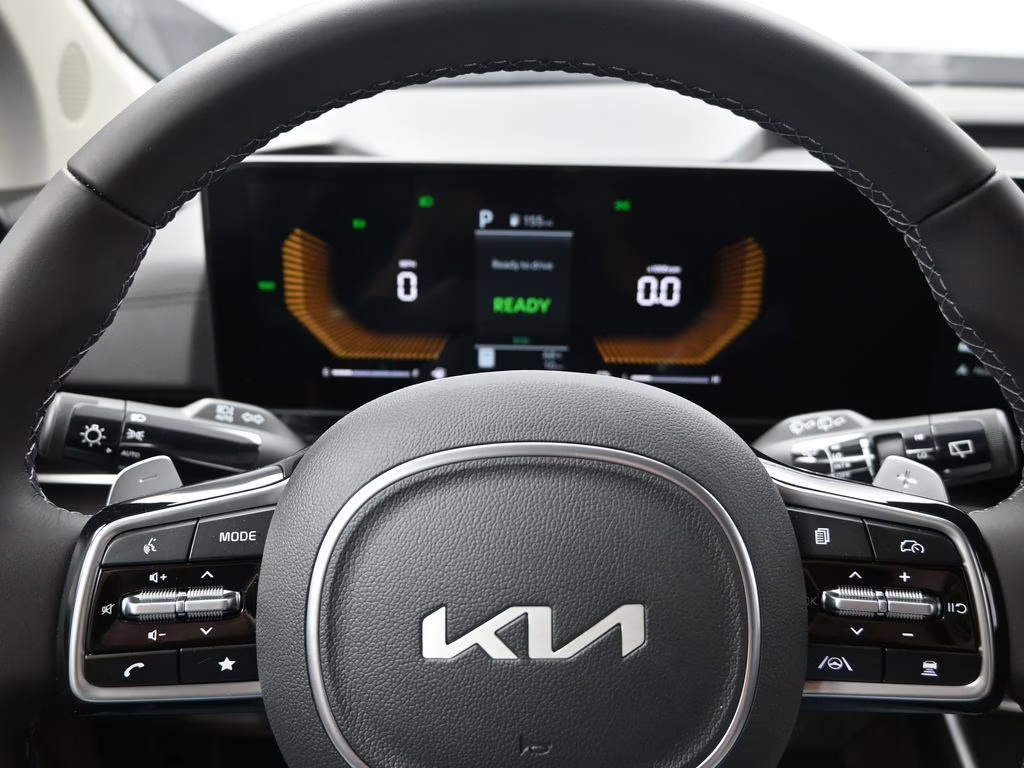 2026 Deep Chroma Blue Kia Carnival Hybrid EX FWD Van