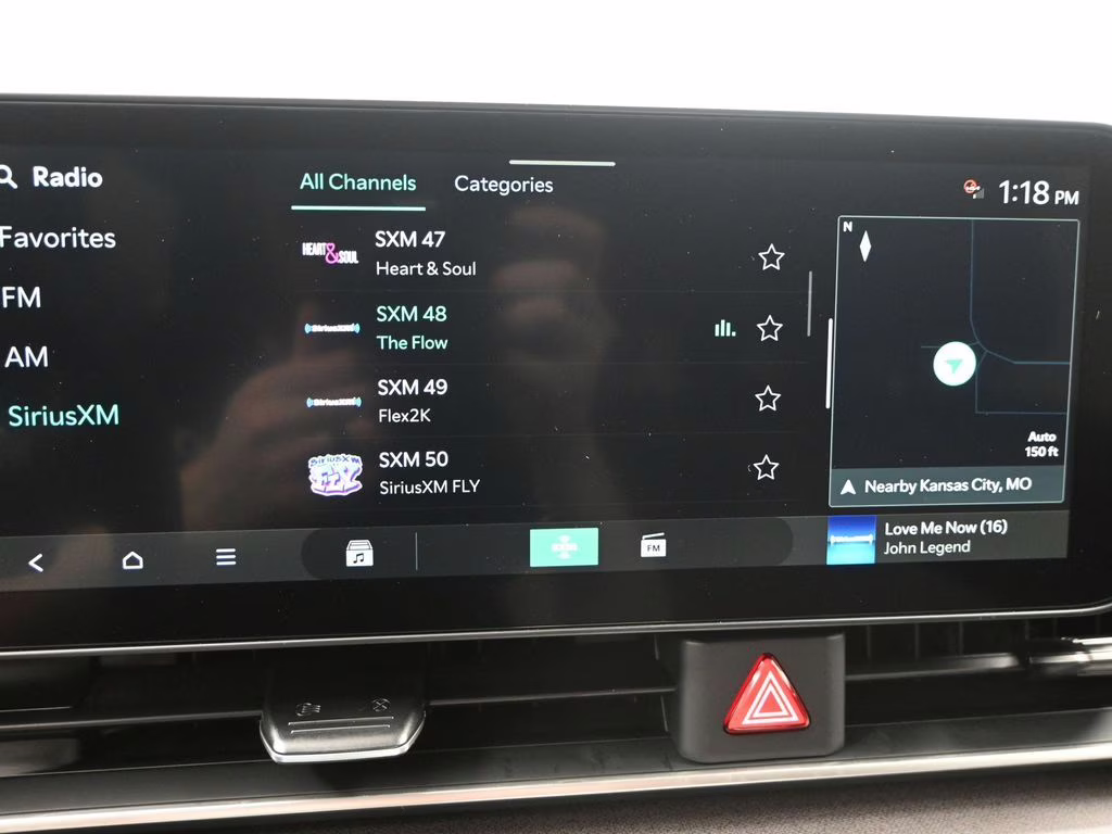 2026 Deep Chroma Blue Kia Carnival Hybrid EX FWD Van