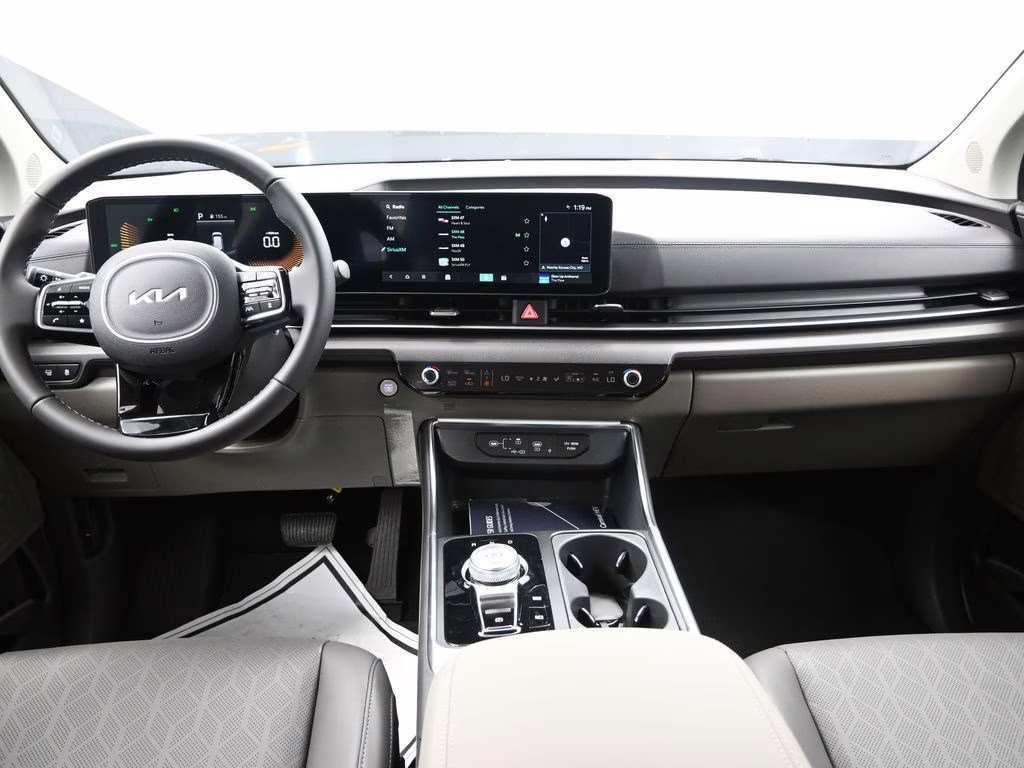 2026 Deep Chroma Blue Kia Carnival Hybrid EX FWD Van