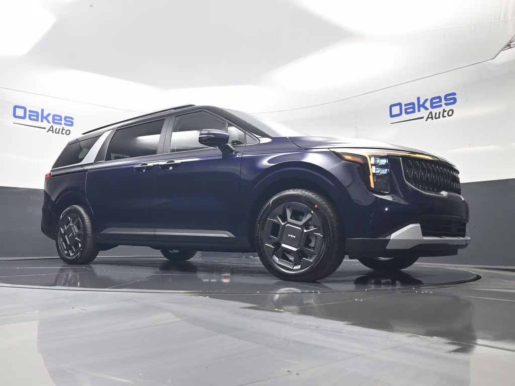 2026 Deep Chroma Blue Kia Carnival Hybrid EX FWD Van