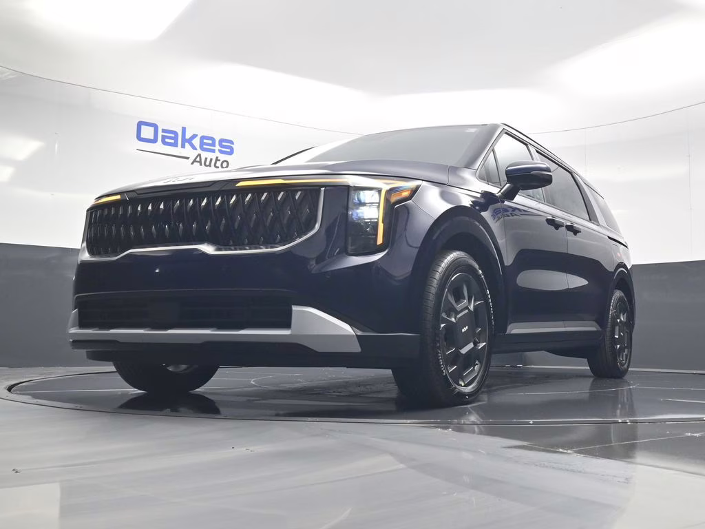 2026 Deep Chroma Blue Kia Carnival Hybrid EX FWD Van