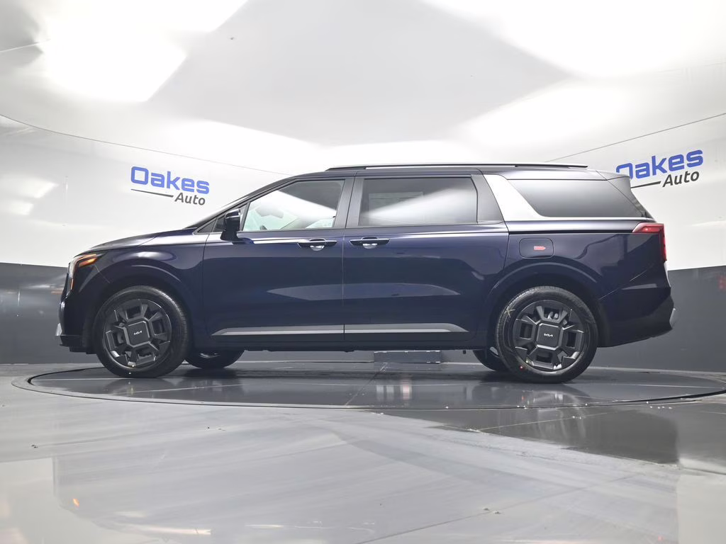 2026 Deep Chroma Blue Kia Carnival Hybrid EX FWD Van