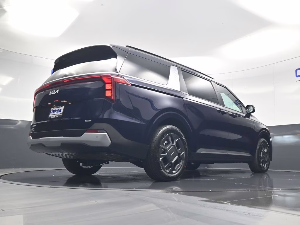 2026 Deep Chroma Blue Kia Carnival Hybrid EX FWD Van