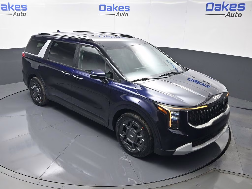 2026 Deep Chroma Blue Kia Carnival Hybrid EX FWD Van