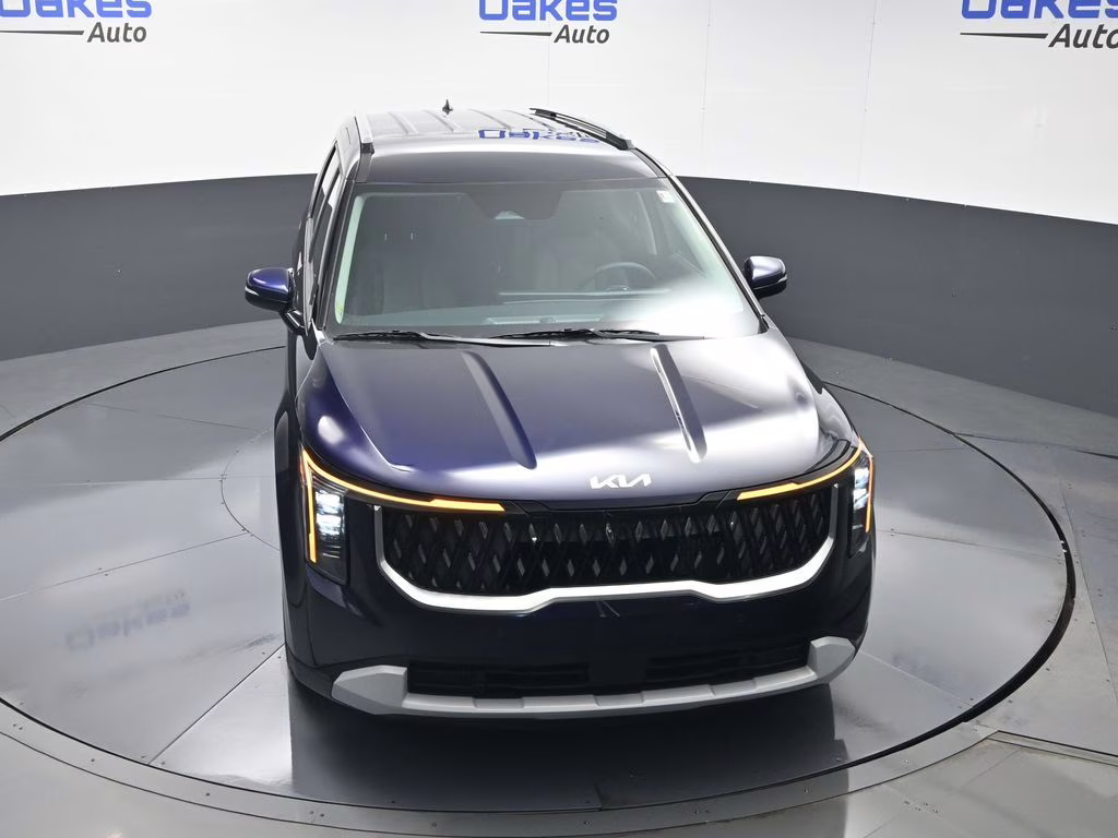 2026 Deep Chroma Blue Kia Carnival Hybrid EX FWD Van