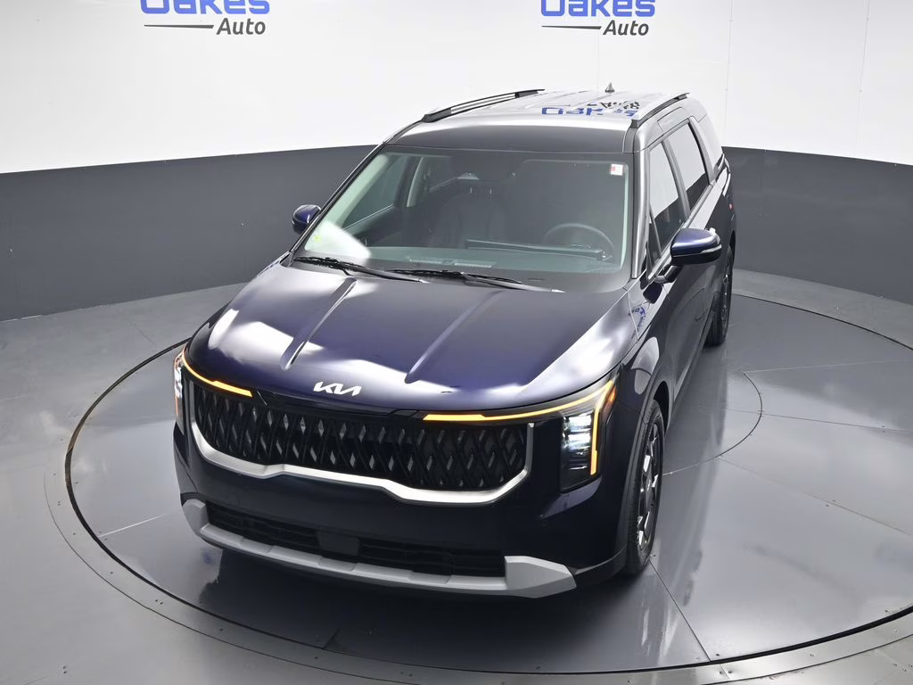 2026 Deep Chroma Blue Kia Carnival Hybrid EX FWD Van