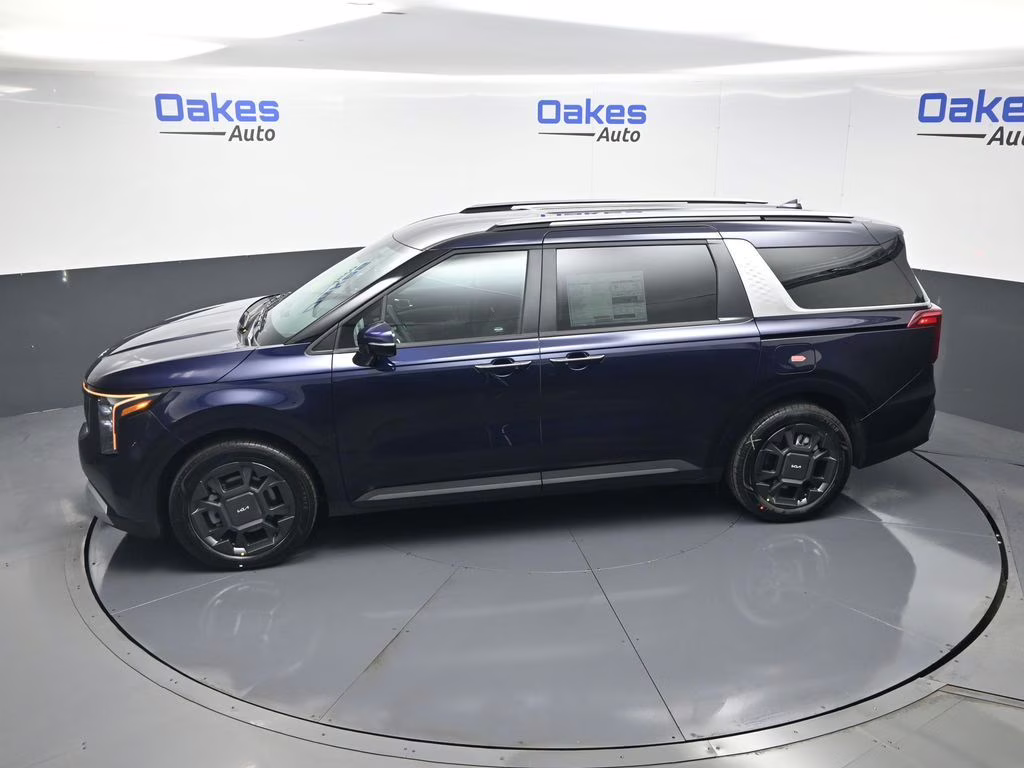 2026 Deep Chroma Blue Kia Carnival Hybrid EX FWD Van