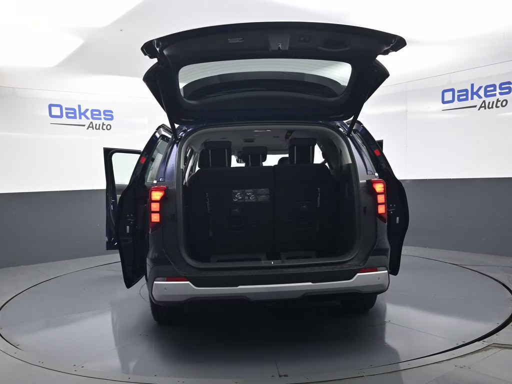 2026 Deep Chroma Blue Kia Carnival Hybrid EX FWD Van