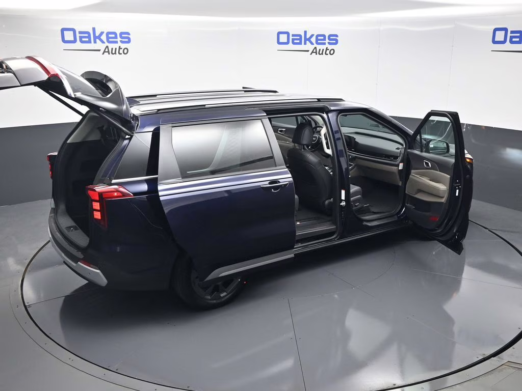 2026 Deep Chroma Blue Kia Carnival Hybrid EX FWD Van
