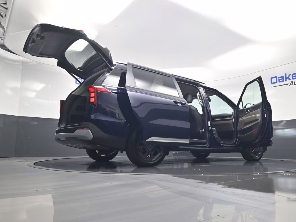 2026 Deep Chroma Blue Kia Carnival Hybrid EX FWD Van