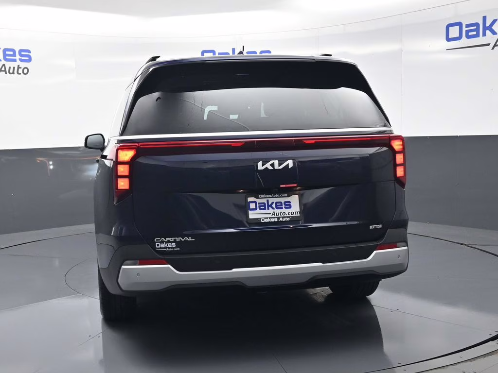 2026 Deep Chroma Blue Kia Carnival Hybrid EX FWD Van