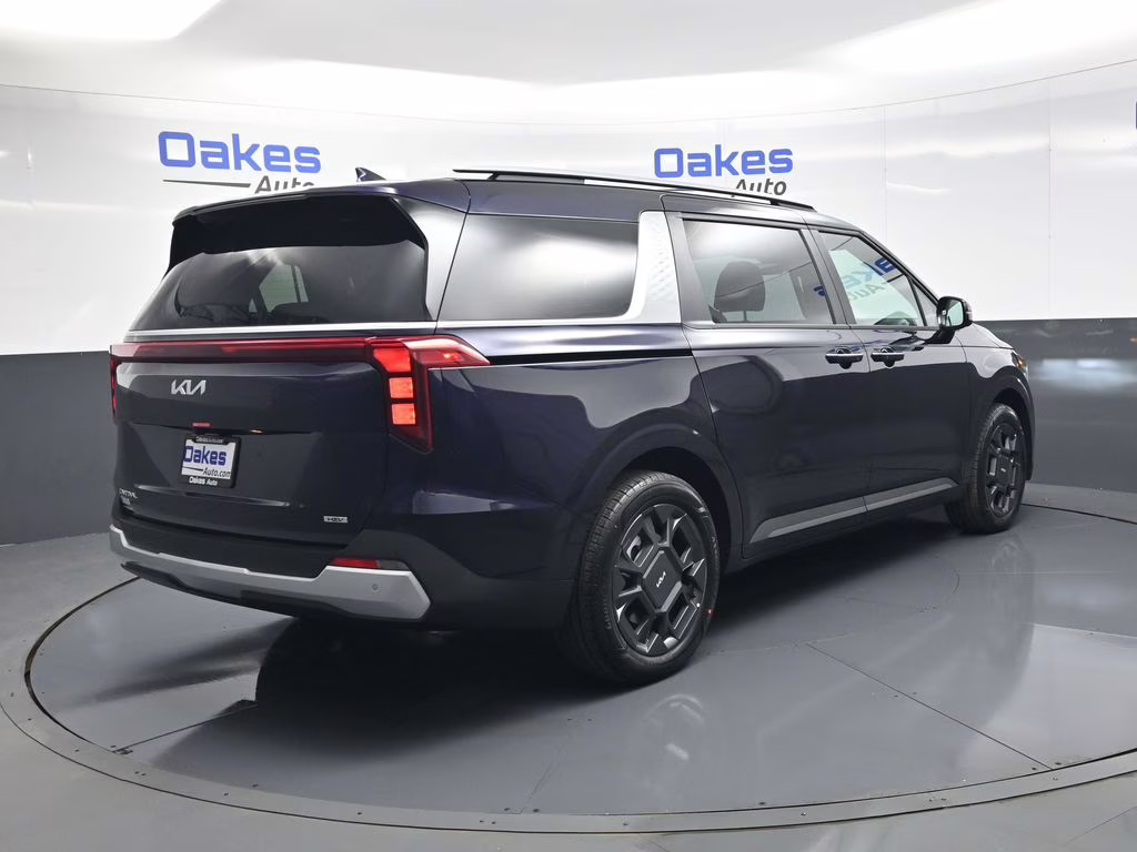 2026 Deep Chroma Blue Kia Carnival Hybrid EX FWD Van