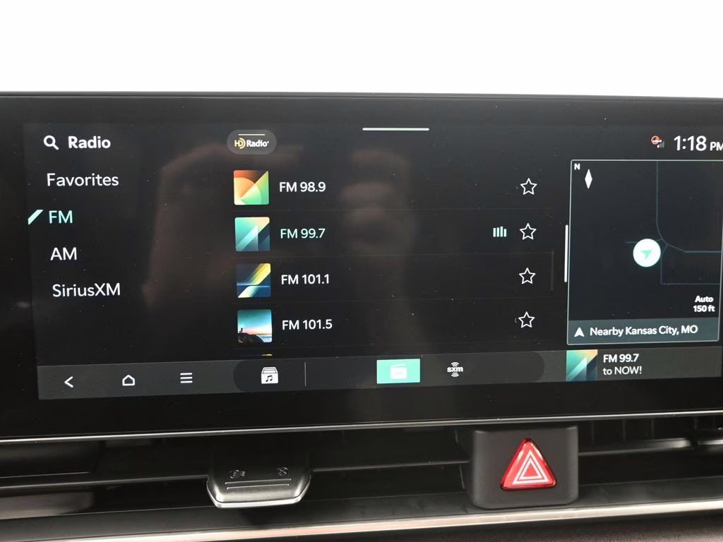2026 Deep Chroma Blue Kia Carnival Hybrid EX FWD Van