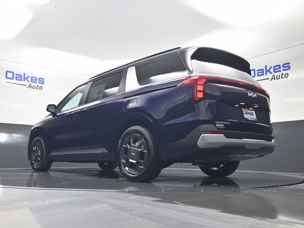 2026 Deep Chroma Blue Kia Carnival Hybrid EX FWD Van