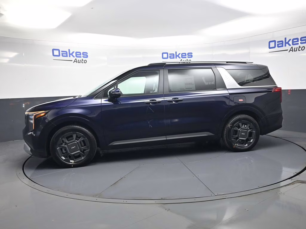 2026 Deep Chroma Blue Kia Carnival Hybrid EX FWD Van