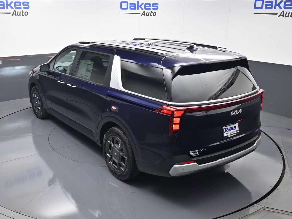 2026 Deep Chroma Blue Kia Carnival Hybrid EX FWD Van