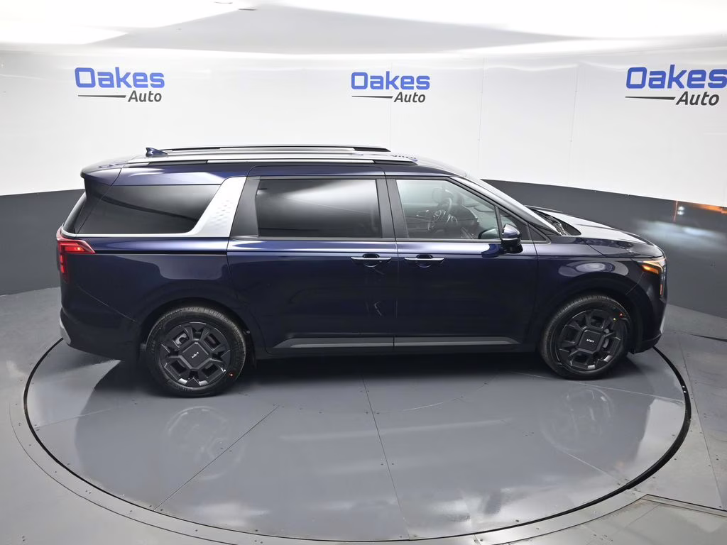 2026 Deep Chroma Blue Kia Carnival Hybrid EX FWD Van
