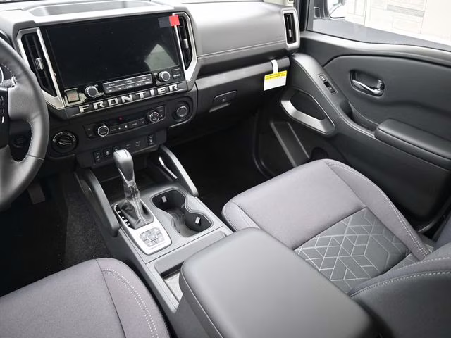 2026 Glacier White Nissan Frontier SV 4X4 Truck