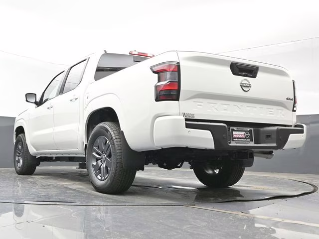 2026 Glacier White Nissan Frontier SV 4X4 Truck
