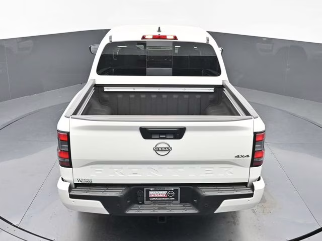 2026 Glacier White Nissan Frontier SV 4X4 Truck