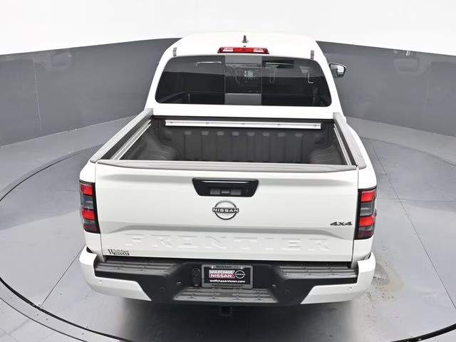 2026 Glacier White Nissan Frontier SV 4X4 Truck