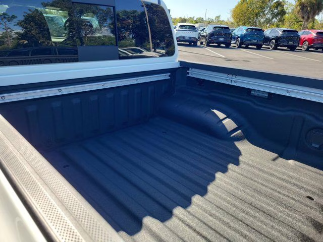 2026 Glacier White Nissan Frontier SV 4X4 Truck