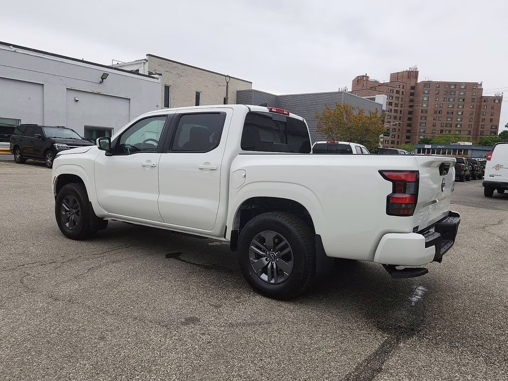 2026 Glacier White Nissan Frontier SV 4X4 Truck