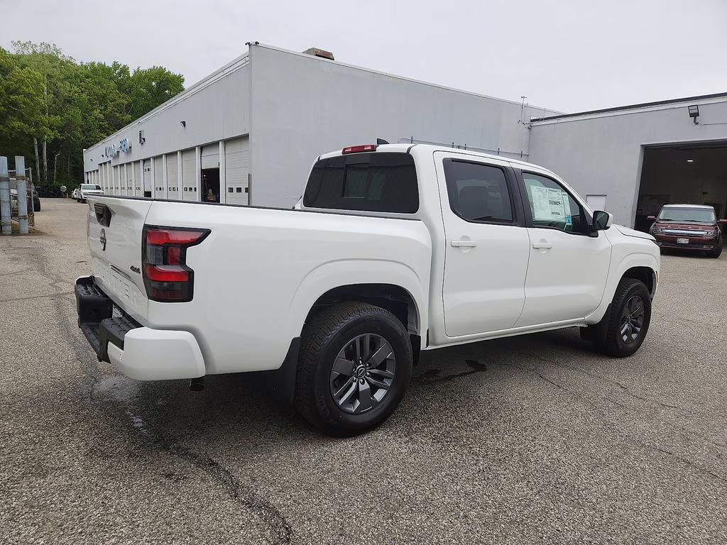 2026 Glacier White Nissan Frontier SV 4X4 Truck