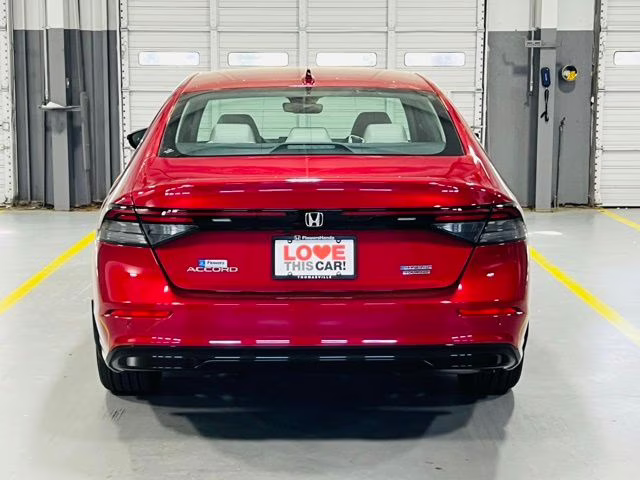 2026 Radiant Red Metallic Honda Accord Hybrid Touring FWD Sedan