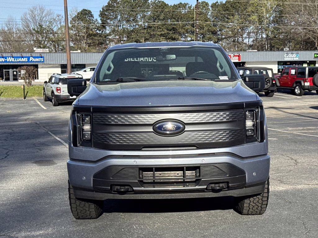 Used 2022 Ford F-150 Lightning XLT with VIN 1FTVW1EL2NWG09771 for sale in Fayetteville, GA