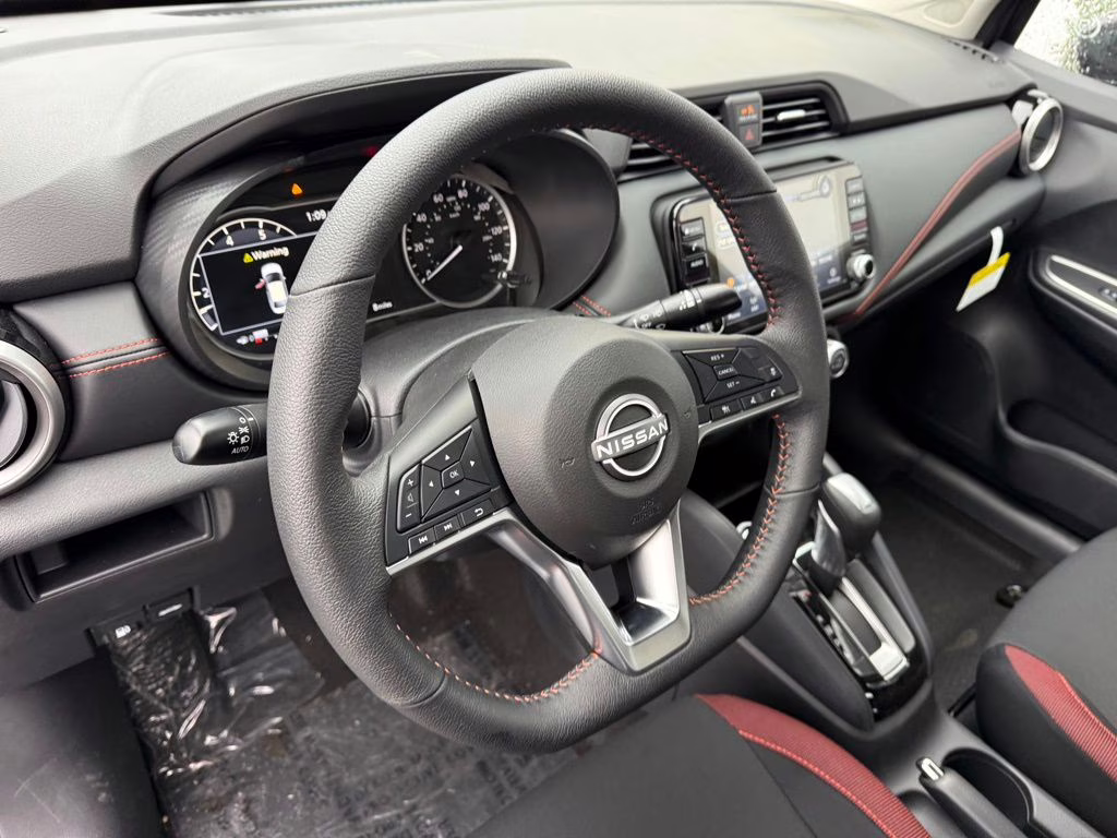 2025 Gun Metallic Nissan Versa 1.6 SR FWD Sedan