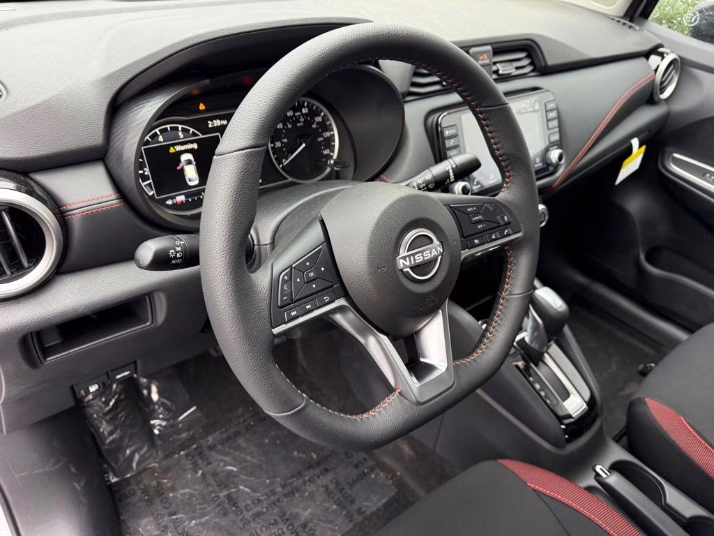 2025 Brilliant Silver Metallic Nissan Versa 1.6 SR FWD Sedan