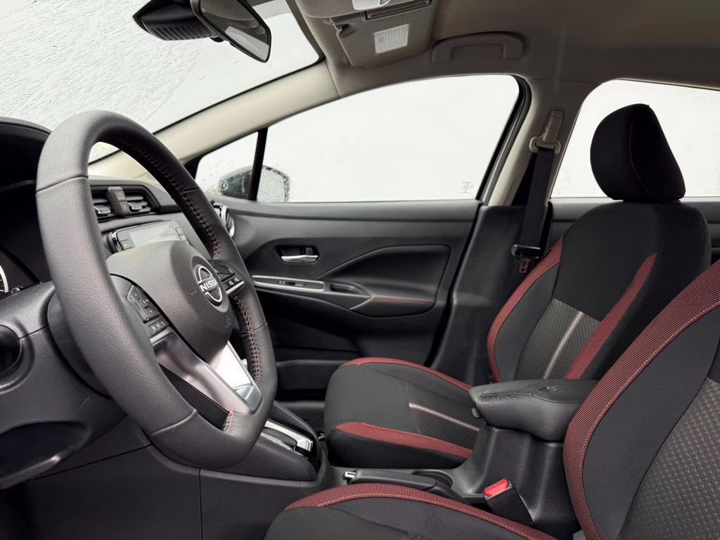 2025 Brilliant Silver Metallic Nissan Versa 1.6 SR FWD Sedan