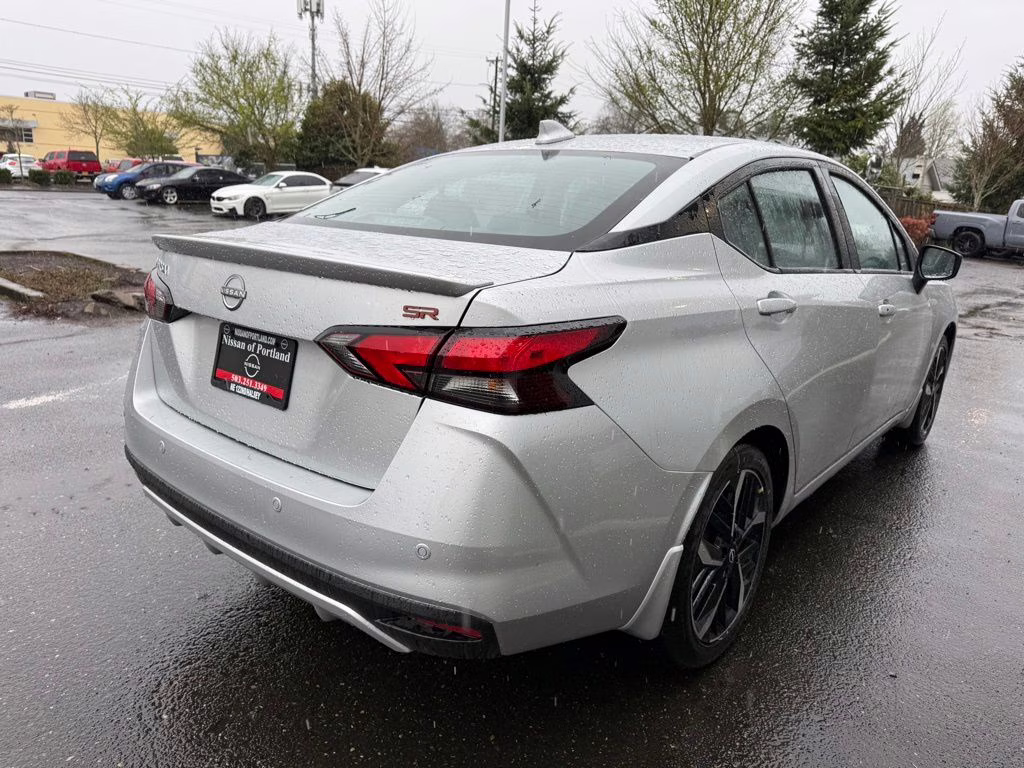 2025 Brilliant Silver Metallic Nissan Versa 1.6 SR FWD Sedan