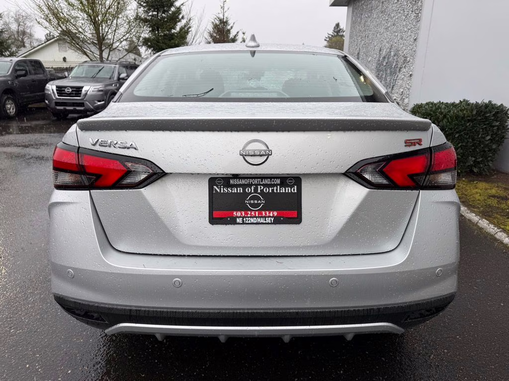 2025 Brilliant Silver Metallic Nissan Versa 1.6 SR FWD Sedan