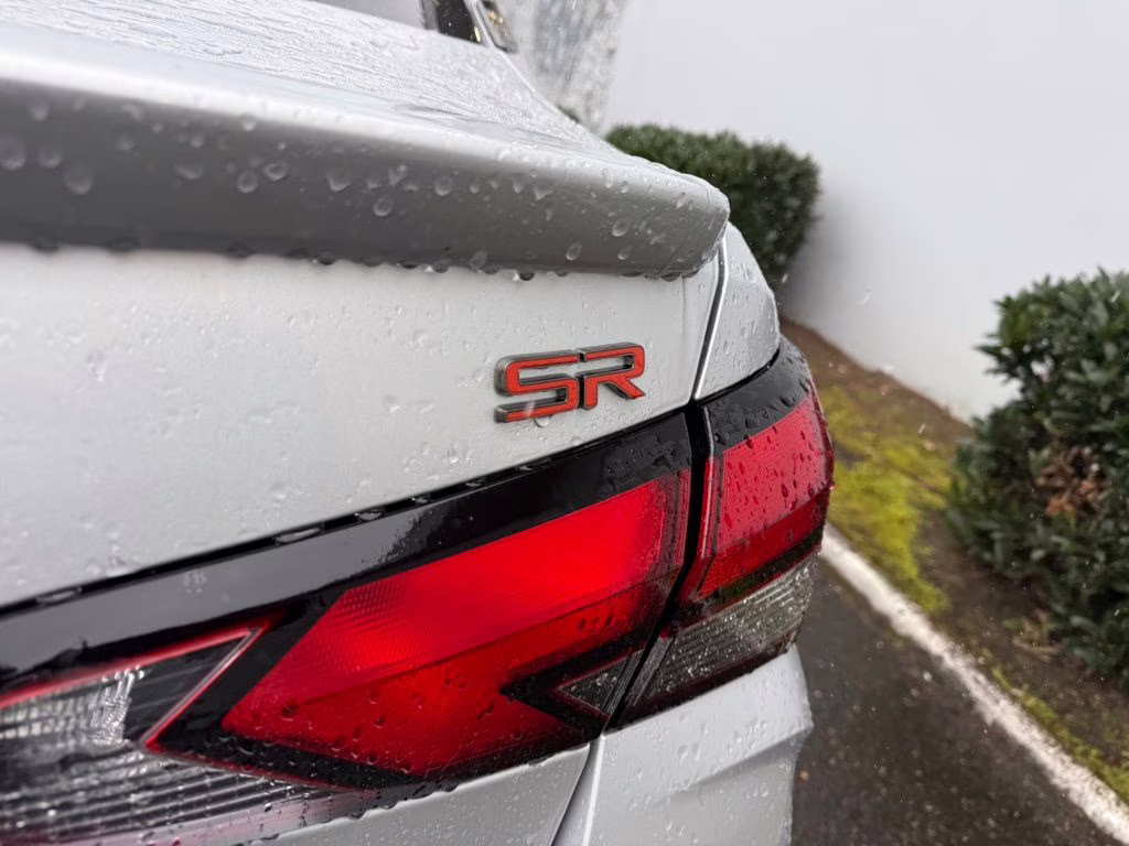 2025 Brilliant Silver Metallic Nissan Versa 1.6 SR FWD Sedan