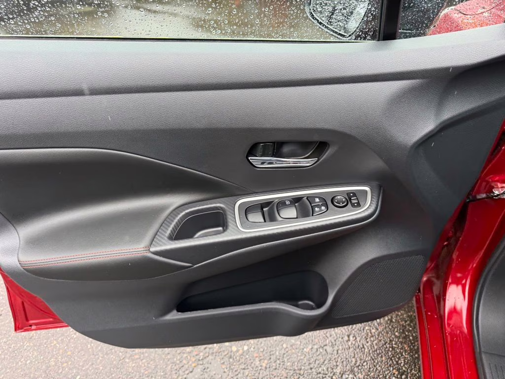 2025 Scarlet Ember Tintcoat Nissan Versa 1.6 SR FWD Sedan