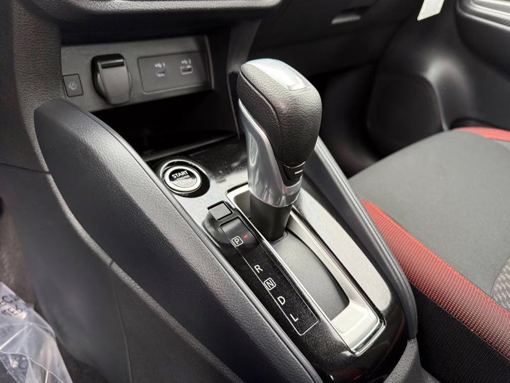 2025 Scarlet Ember Tintcoat Nissan Versa 1.6 SR FWD Sedan