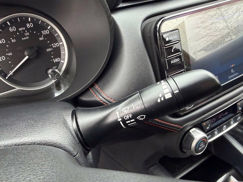 2025 Scarlet Ember Tintcoat Nissan Versa 1.6 SR FWD Sedan