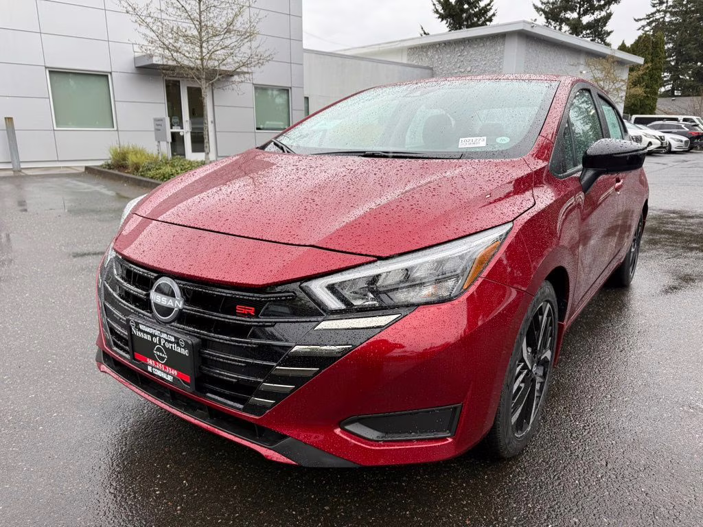 2025 Scarlet Ember Tintcoat Nissan Versa 1.6 SR FWD Sedan