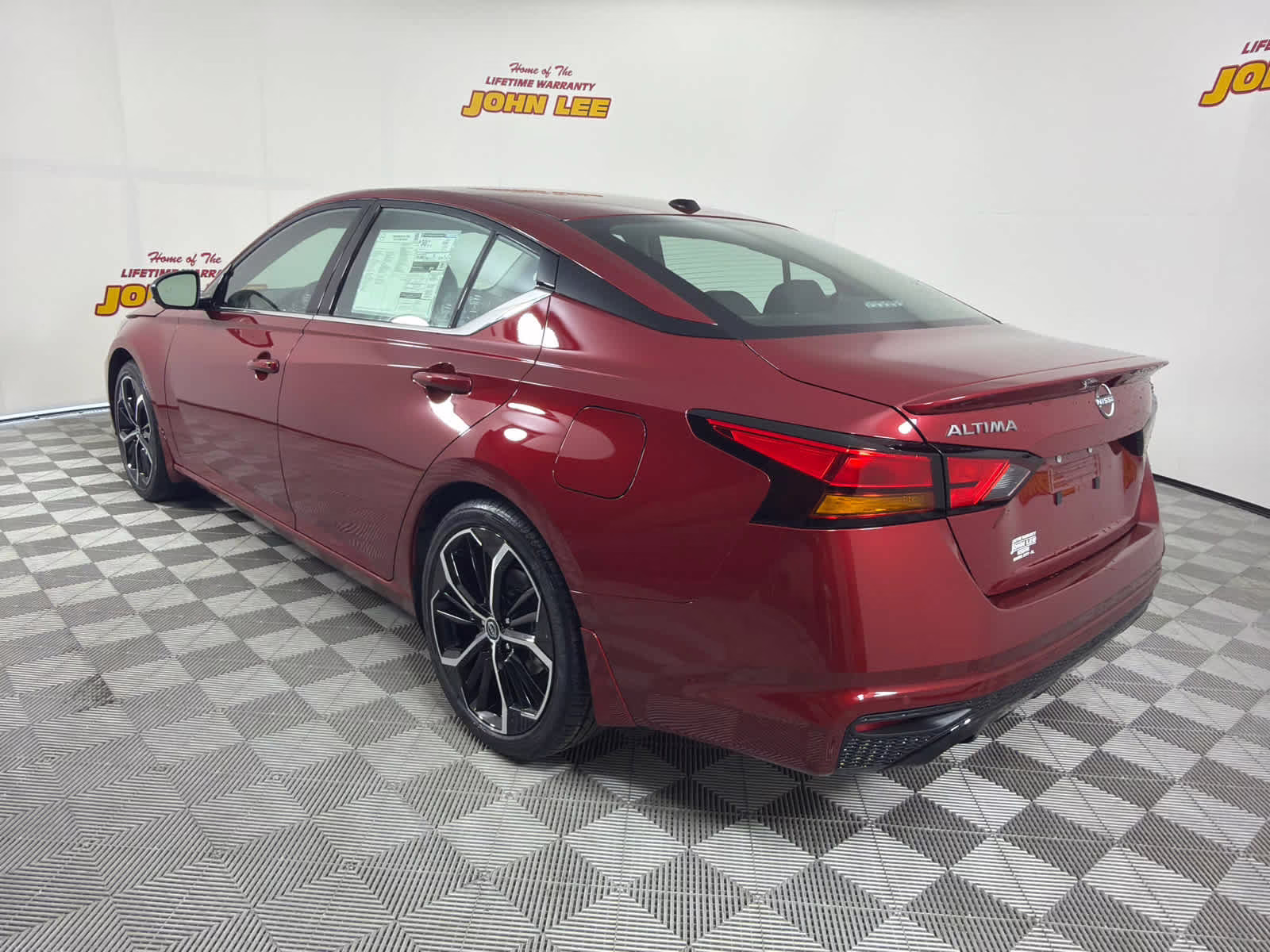 2026 Scarlet Ember Tintcoat Nissan Altima SR FWD Sedan