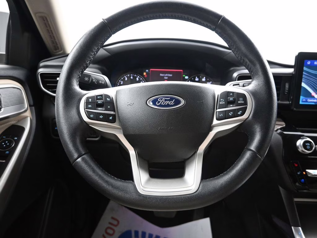 2023 Green Metallic Ford Explorer Limited 4X4 SUV