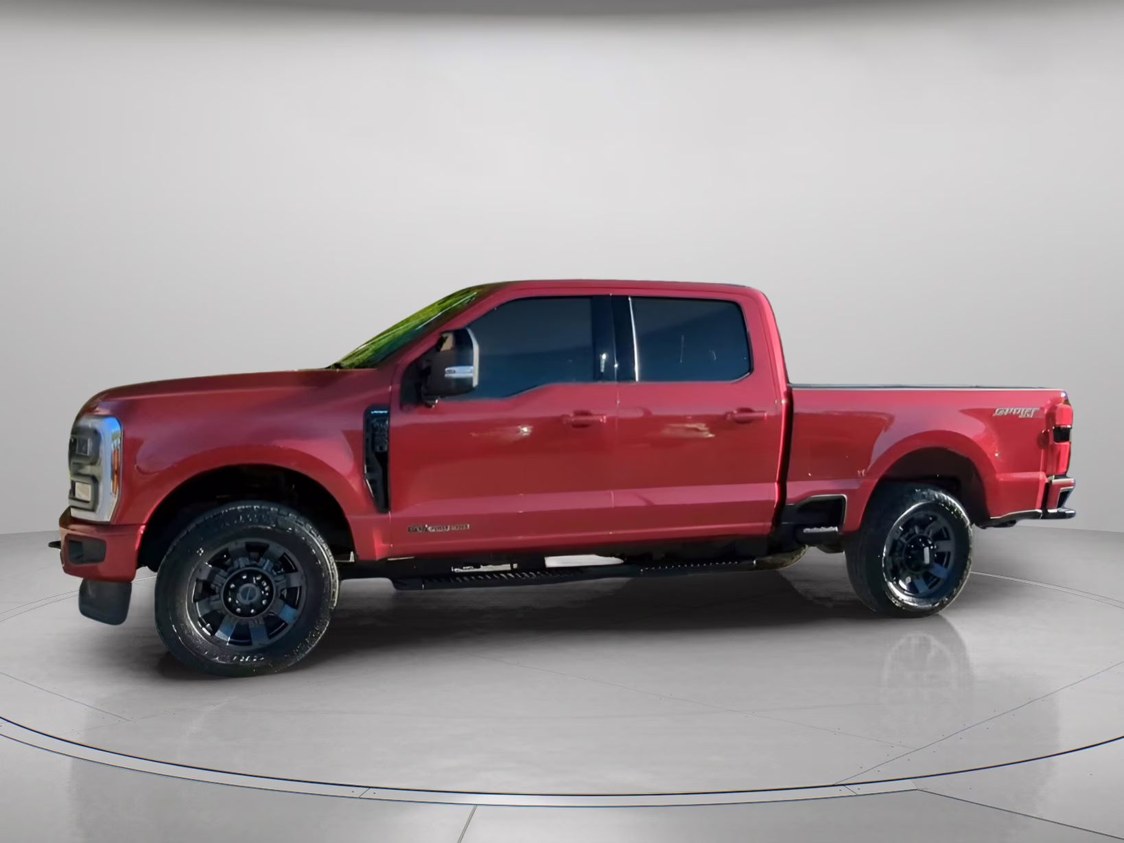 2024 Rapid Red Metallic Tinted Clearcoat Ford Super Duty F-250 SRW LARIAT Crew Cab Pickup 4X4 Truck