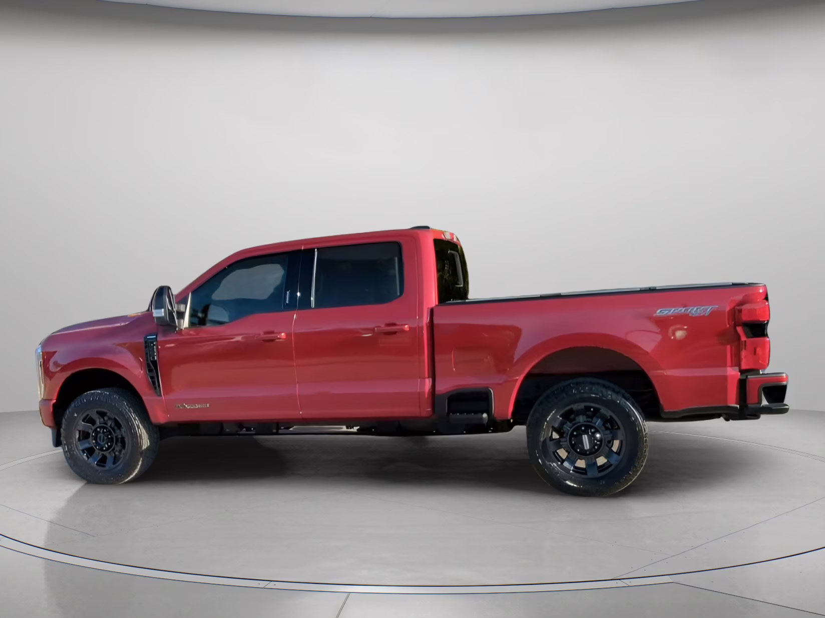 2024 Rapid Red Metallic Tinted Clearcoat Ford Super Duty F-250 SRW LARIAT Crew Cab Pickup 4X4 Truck
